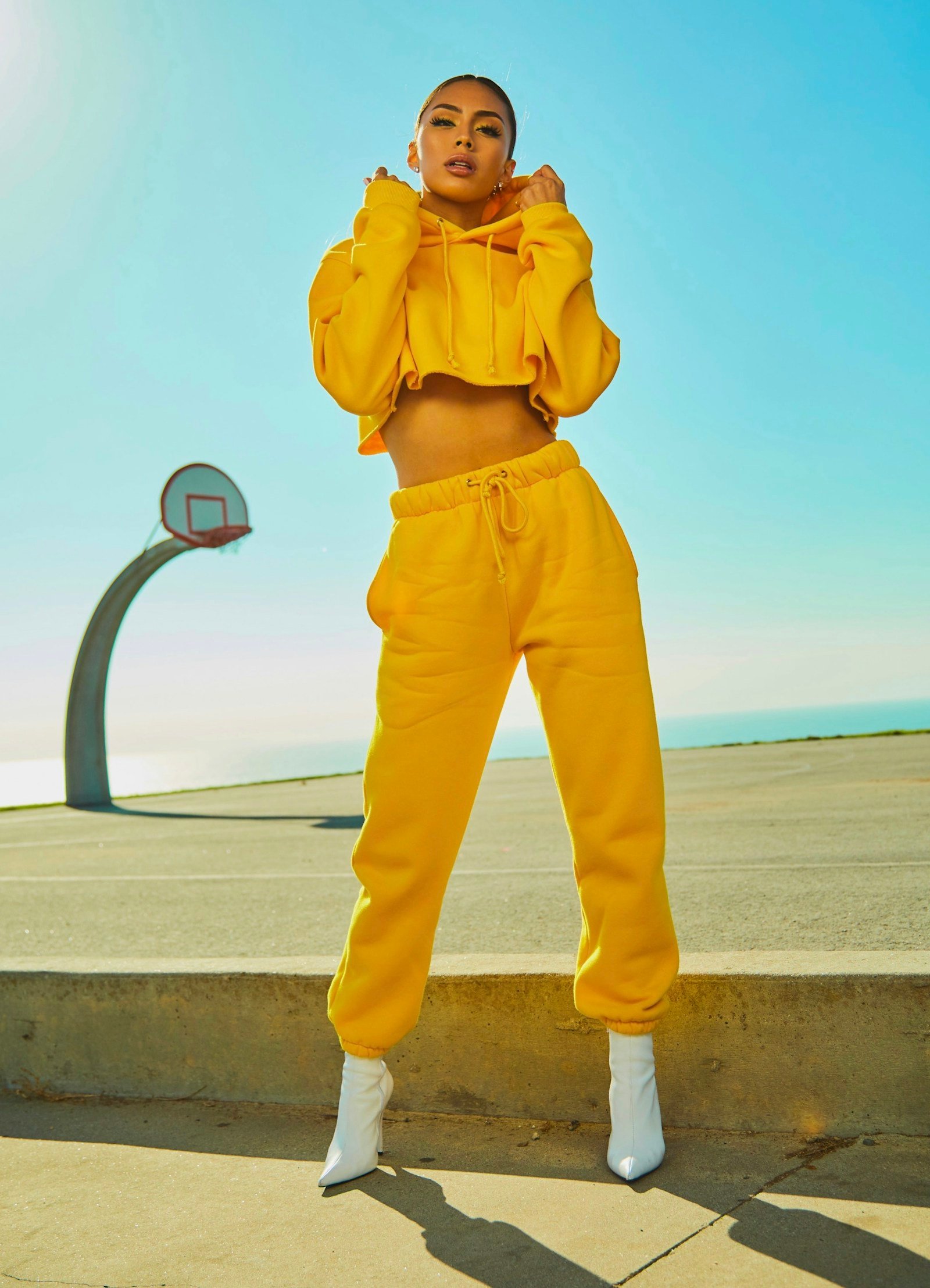 Woman in a vivid yellow co-ord